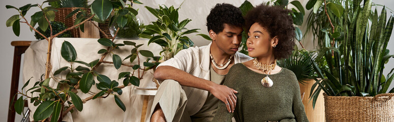 Embracing love in a stylish indoor garden with a young couple sharing a tender moment