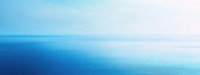 Smooth blue gradient of the ocean meeting the sky, creating a calm, serene, and visually peaceful seascape.