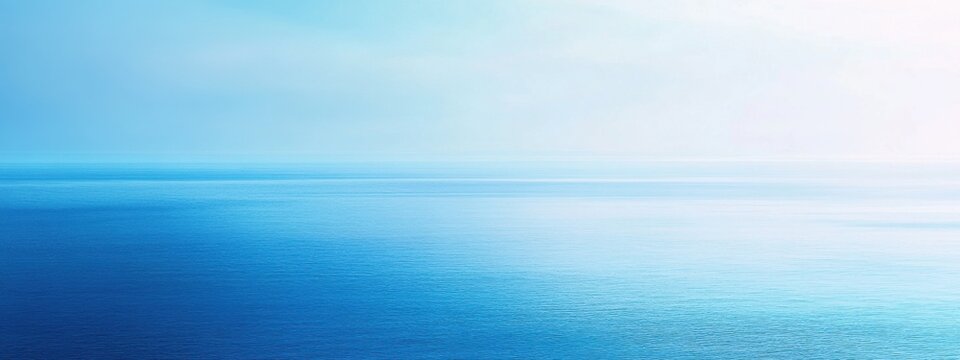 Smooth blue gradient of the ocean meeting the sky, creating a calm, serene, and visually peaceful seascape.