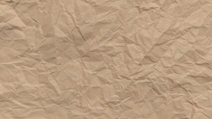 Crumpled old rough brown paper background with natural folds and creases. Crumpled old brown vintage paper surface texture for background. Crumpled brown recycle paper texture.