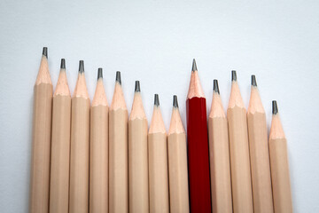 Standing Out from the Crowd – Red Pencil Symbolizing Leadership, Uniqueness, and Creativity