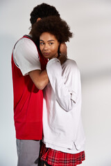 Young couple embracing in a stylish and modern setting, showcasing their love and affection