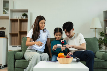 Family Asian spending happy time together on vacation.