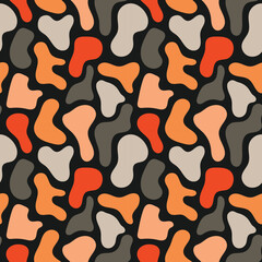 Abstract seamless pattern with organic red, orange, beige, and gray shapes on vibrant background