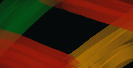 Abstract paint brush textured stripes in traditional African colors red, yellow green on black background. Black history month brush color background, african flag colors, icon of african american