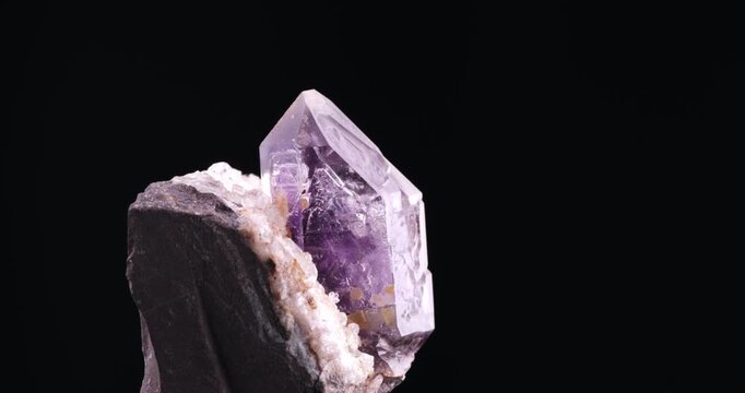 Amethyst from Erongo, Namibia. macro footage detail texture background. close-up mineral crystal unpolished semi-precious gemstone