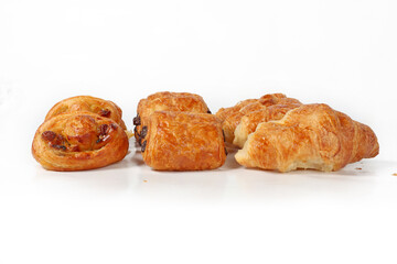 Assortment of mini pastries on a white background