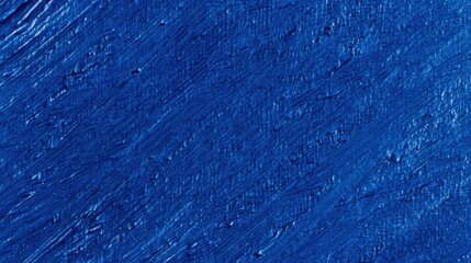 Textured Blue Background Featuring a Rough Surface Evoking Depth and Dimension Ideal for Creative Projects and Artistic Design Applications