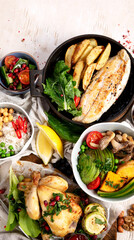 Family dinner table. Table full of homemade food.
