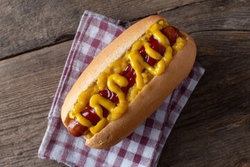 Juicy hot dog with swirls of mustard and ketchup, picnic Americana, indulgent craving, National Hot Dog Day delight