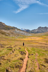 Lone Hiker on Mountain Path