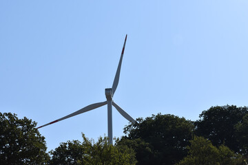 Wind turbine on the mountain in Sicily, Italy. Wind turbine and countryside Italian summer...