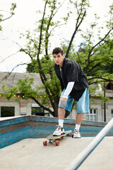 Young man carving through a park skate ramp with a dynamic stance and focused expression
