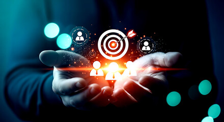 Hands holding glowing target with people icons and bokeh lights in dark blue dart arrow