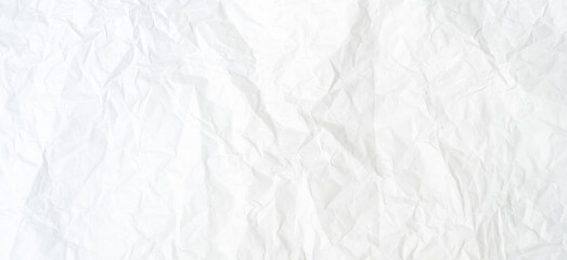 Top view and full frame of wrinkled or crumpled white paper texture used as crumpled white paper background texture in decorative art work