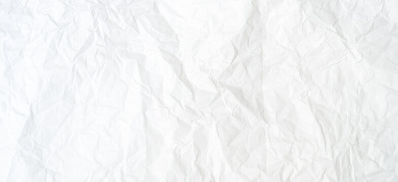 Top view and full frame of wrinkled or crumpled white paper texture used as crumpled white paper background texture in decorative art work