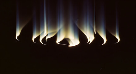Abstract vertical light streaks with curved edges against a dark background scene view