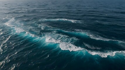 "Aerial View of Ocean Waves in Deep Blue Sea"