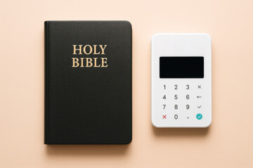 Faith and Finance Symbolized by Bible and Card Reader