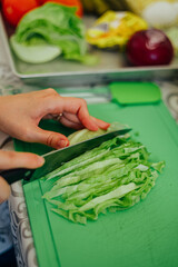 Chopping Fresh Lettuce for a Healthy Meal Prep