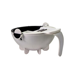High resolution image of a multi function vegetable cutter with integrated grater and bowl. Isolated on a white background, ideal for food preparation themes. Clean and professional studio lighting