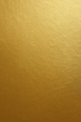Rich textured golden metallic background with subtle shimmer and light reflection