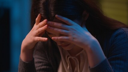 Sad woman upset worried at home night evening confused girl Caucasian female girl thinking breakup...