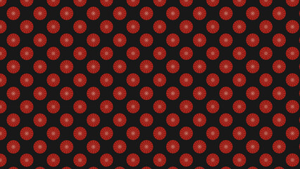 A repeating pattern of red floral shapes on a dark background in a symmetrical arrangement style