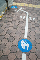 Queue Line Marking on Japanese Sidewalk for Public Bus Transportation