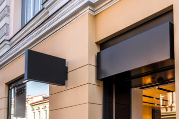 Two Mock Ups Of Restaurant Street Black Signboards On Yellow Wall