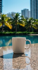 White Coffee Mug by Poolside with Tropical Background and Sunlight Reflections – Urban Summer Morning Concept