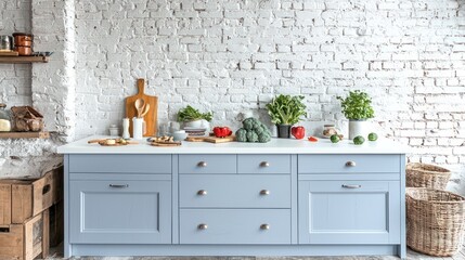 Light gray kitchen cabinets with white brick wall and fresh produce on the countertop.