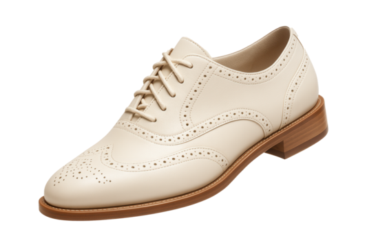 Ivory brogues with subtle perforations and a low stacked heel