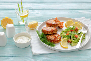 Hot Smoked salmon burgers, patties and coleslaw