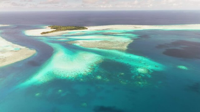High-quality drone shot orbiting to expose the radiant blue waters and wild island landscapes within Palau&rsquo;s archipelago.
