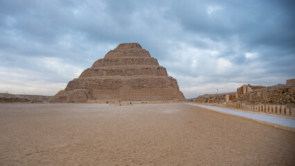 The Step Pyramid of Djoser at Saqqara, Egypt. An ancient architectural marvel from Egypt's Old Kingdom period.