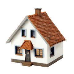 Miniature white house with terracotta roof