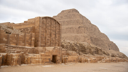 The Step Pyramid of Djoser at Saqqara, Egypt. An ancient architectural marvel from Egypt's Old Kingdom period.