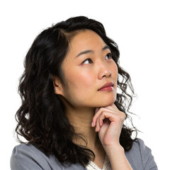 A young asian woman is thoughtfully looking up while contemplating a solution against a transparent background