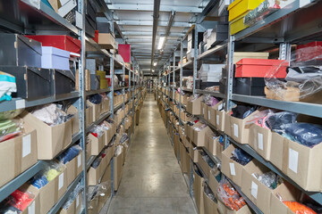 Warehouse Aisle with Organized Shelving and Boxes