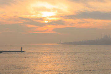 two lighthouse of istanbul and Sunset over the sea in Bosphorus Strait, Istanbul, Turkey