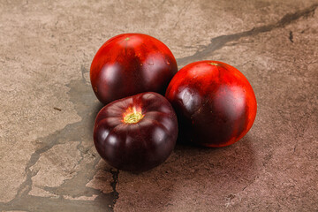 Black ripe juicy organic tomato
