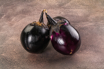 Raw violet and black eggplant