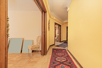 An interesting wallpaper can turn a drab hallway into a focal point.