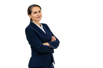 A professional businesswoman in a dark blue suit stands confidently with arms crossed gazing off to the side isolated on transparent