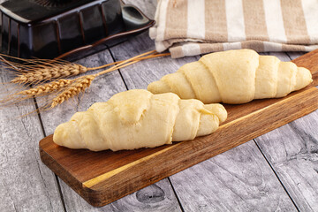 Raw uncooked croissant for bake