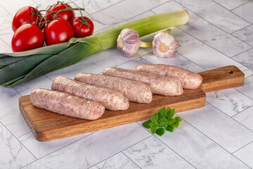 Raw pork sausages for grill