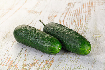 Ripe green raw two cucumbers