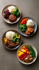 Experience a vibrant variety of meals, featuring grilled meats, rice, and colorful vegetables, perfectly plated for a wholesome dining experience.