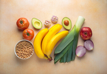 Promoting gut health with prebiotic foods including bananas, lentils, chickpeas, leeks, garlic,...